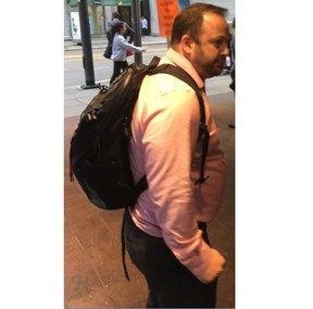 An image released by Toronto Police of a man sought in a voyeurism investigation at a business in the Yonge and King Sts. area on Sept. 18, 2019.