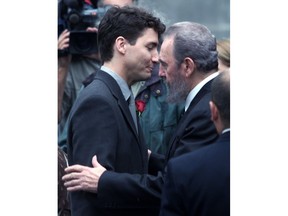 Justin Trudeau hugs Cuba’s Fidel Castro in October 2000. Trudeau has been criticized for his praise of the now-dead communist dictator.