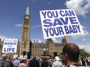 Anti-abortion protestors march on Parliament Hill in 2013.