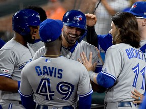 Toronto Blue Jays' Randal Grichuk, second from left, celebrates with teammates after hitting a four-run home run during the ninth inning against the Baltimore Orioles at Oriole Park at Camden Yards on Sept. 18, 2019 in Baltimore, Maryland. (Will Newton/Getty Images)