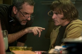Todd Phillips directs Joaquin Phoenix in a scene from Joker. (Warner Bros.)