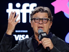Musician Robbie Robertson gestures as he speaks during a news conference for the biopic "Once Were Brothers: Robbie Robertson and The Band" at the Toronto International Film Festival (TIFF) in Toronto Sept. 5, 2019.