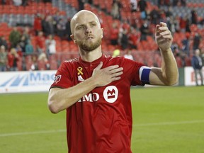 Sep 15, 2019; Toronto, Ontario, CAN; Toronto FC midfielder Michael Bradley (4) acknowledges the fans after a win over Colorado Rapids at BMO Field.