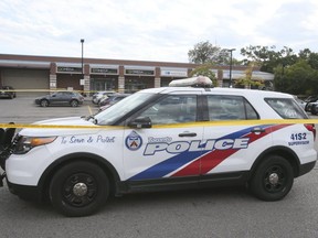 Toronto Police cordoned off a plaza at Victoria Park Ave. and Kingston Rd., near Neil McNeil Catholic High School, after a teenage boy was stabbed on Thursday, Sept. 26, 2019. (Veronica Henri/Toronto Sun/Postmedia Network)