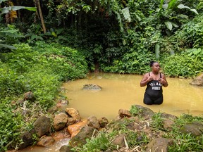 The naturally hot Clabony Sulfur Springs is tucked in the hills of the village of Byelands in the parish of St. Andrews. (Ling Hui/Postmedia Network)
