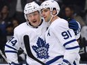 John Tavares of the Toronto Maple Leafs celebrates his goal with Morgan Rielly against the Los Angeles Kings at Staples Center on November 13, 2018 in Los Angeles. (Harry How/Getty Images)