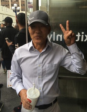 Tony Yang is extremely proud of his son Wilson, the owner of Toronto’s new Chick-Fil-A franchise. (Joe Warmington/Toronto Sun/Postmedia Network)
