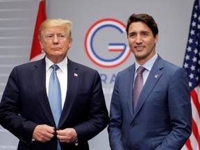 U.S. President Donald Trump, left, and Prime Minister Justin Trudeau hold a bilateral meeting during the G7 summit in Biarritz, France, August 25, 2019. REUTERS/Carlos Barria