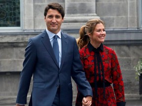 Prime Minister Justin Trudeau and wife Sophie Gregoire Trudeau leave Rideau Hall after asking Governor General Julie Payette to dissolve Parliament, and mark the start of a federal election campaign in Canada, in Ottawa September 11, 2019.  REUTERS/Patrick Doyle