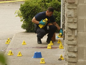 Peel Regional Police officers investigate a murder at Wally's Restaurant on Sept. 1, 2019. (Jack Boland, Toronto Sun)