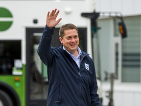 Andrew Scheer, leader of the Conservative Party of Canada, steps off a bus before making an announcement at the GO Transit Streetsville Bus Garage in Mississauga, Ont. on Friday September 13, 2019. Ernest Doroszuk/Toronto Sun/Postmedia