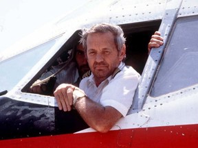 June 19, 1985 at the Beirut airport, shows former TWA pilot John Testrake answering journalists' questions with a gun pointed near his head.  A Lebanese man accused of involvement in the hijacking of a TWA plane and the murder of a US navy diver has been arrested in Greece,