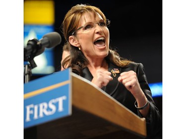 Oct. 2, 2008: Republican vice presidential candidate Sarah Palin responds to cheers upon her arrival for a post-debate rally at St. Louis University's Chaifetz Arena in St. Louis, Miss.  (AFP PHOTO / Robyn BECK)