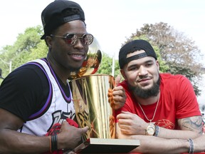 Raptors Kyle Lowry and Fred VanVleet (right) with the NBA championship in June. VanVleet is getting a lot more respect than he used to around the league, especially after his performance in the series-clinching Game 6. (Veronica Henri/Toronto Sun)