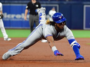 Vladimir Guerrero Jr. of the Toronto Blue Jays slides into third after hitting a triple at Tropicana Field on September 5, 2019 in St. Petersburg. (Julio Aguilar/Getty Images)