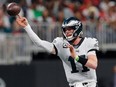 Carson Wentz of the Philadelphia Eagles looks to pass against the Atlanta Falcons during the second half at Mercedes-Benz Stadium on Sept. 15, 2019, in Atlanta, Ga.