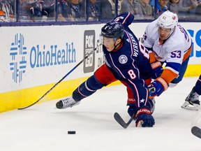 Columbus Blue Jackets’ Zach Werenski (left) inked a three-year, $15 million US deal with the team on Monday. Getty Images