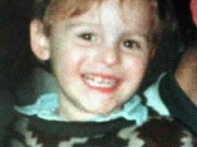 James Bulger who was beaten to death by Jon Venables and Robert Thompson on a railway line in Liverpool, England, in February 1993 is shown in this undated file photo.