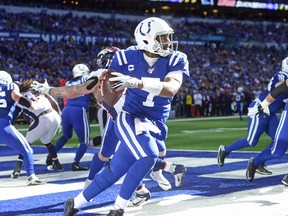 Indianapolis Colts quarterback Jacoby Brissett runs out of the pocket and in the end zone against the  Denver Broncos last week. (USA TODAY SPORTS)