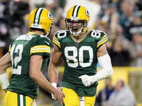 Green Bay Packers' Aaron Rodgers and Jimmy Graham celebrate a touchdown last week. (GETTY IMAGES)