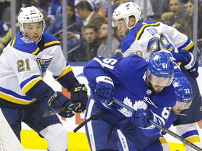 St. Louis Blues' Tyler Bozak chases Maple Leafs' Nic Petan at Scotiabank Arena on Monday, Oct. 7, 2019. (STAN BEHAL/Toronto Sun)