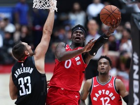 Raptors rookie Terence Davis drives to the basket against Houston Rockets’ Ryan Anderson during Tuesday's game. (GETTY IMAGES)