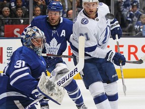 Tampa’s Steven Stamkos looks to tip a high puck at Maple Leafs goalie Frederik Andersen last night. Andersen gave up seven goals before his was pulled.  Claus Andersen/Getty Images