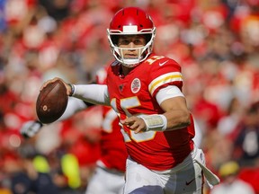 Patrick Mahomes of the Kansas City Chiefs throws a six-yard touchdown pass in the third quarter against the Houston Texans at Arrowhead Stadium on October 13, 2019 in Kansas City, Missouri.