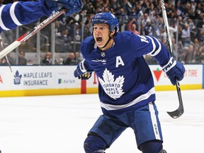 Mitchell Marner of the Toronto Maple Leafs celebrates his overtime game winning goal against the Boston Bruins at Scotiabank Arena on October 19, 2019 in Toronto, Ontario, Canada.