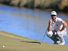Adam Hadwin of Canada lines up a putt on the 18th green during the final round of the Shriners Hospitals for Children Open at TPC Summerlin on October 6, 2019 in Las Vegas, Nevada.
