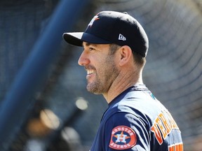 Justin Verlander of the Houston Astros looks on during batting practice prior to Game 3 of the American League Championship Series against the New York Yankees at Yankee Stadium on October 15, 2019 in New York.