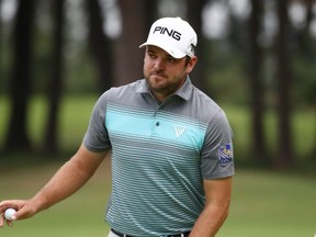 Corey Conners of Canada acknowledges the fans after the birdie on the 16th green during the third round of the Zozo Championship at Accordia Golf Narashino Country Club on October 27, 2019 in Inzai, Chiba, Japan. (Photo by Chung Sung-Jun/Getty Images)