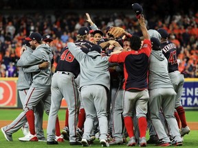 The Washington Nationals celebrate after defeating the Houston Astros 6-2 in Game Seven to win the 2019 World Series in Game Seven of the 2019 World Series at Minute Maid Park on October 30, 2019 in Houston, Texas.