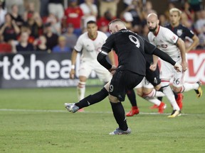 D.C. United forward Wayne Rooney scores the game-tying goal against TFC earlier this season. (USA TODAY SPORTS)