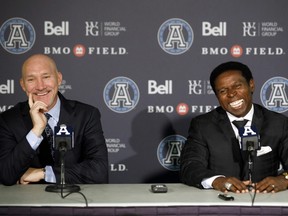 Bill Manning, left, president of the Toronto Argonauts and Mike (Pinball) Clemons speak as Clemons is announced as the new general manager of the Toronto Argonauts during a press conference at BMO Field in Toronto, Tuesday, Oct. 8, 2019. THE CANADIAN PRESS/ Cole Burston