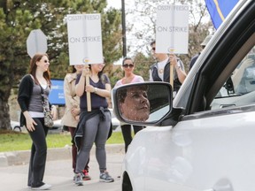 This Toronto Sun file photo shows teachers on picket lines outside Peel District School Board offices on Hurontario St. in 2015.