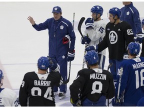 Coach Mike Babcock talks to the team at Toronto Maple Leaf practice at the Ford Performance centre in Toronto on Monday September 30, 2019. Craig Robertson/Toronto Sun/Postmedia Network