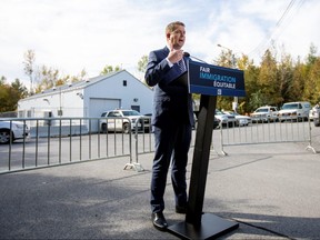 Conservative leader Andrew Scheer speaks at the illegal border crossing at Roxham Road in Quebec.