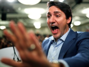 Liberal leader and Canadian Prime Minister Justin Trudeau attends a rally during an election campaign visit to Mississauga, Ontario, Canada October 12, 2019. REUTERS/Stephane Mahe ORG XMIT: GGGMAHE15