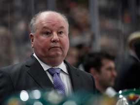 Head coach Bruce Boudreau of the Minnesota Wild behind the bench. (Photo by Hannah Foslien/Getty Images)