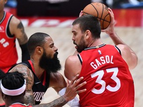 Toronto Raptors centre Marc Gasol (R) is guarded by Houston Rockets center Tyson Chandler (L) during the National Basketball Association (NBA) Japan Games 2019 pre-season basketball match between the Houston Rockets and Toronto Raptors in Saitama, a northern suburb of Tokyo on October 10, 2019. (Photo by TOSHIFUMI KITAMURA / AFP)