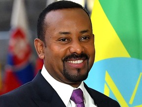 In this file photo taken on Jan. 24, 2019, Ethiopia's Prime Minister Abiy Ahmed smiles as he is welcomed by the European Commission President (unseen) at the European Commission in Brussels. (EMMANUEL DUNAND/AFP via Getty Images)