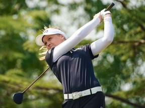 Brooke M. Henderson of Canada plays a shot during the third round of the Shanghai LPGA golf tournament in Shanghai on Ocotber 19, 2019.