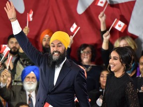 NDP Leader Jagmeet Singh and his wife Gurkiran Kaur step on stage under the cheers of his supporters at the NDP Election Night Party in Burnaby B.C., on October 21, 2019. -  (Photo by Don MacKinnon / AFP)