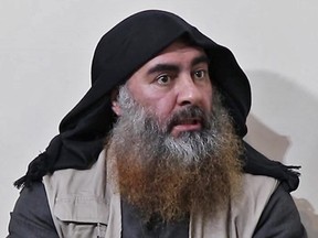 In this photo taken on April 30, 2019 from a video released by Al-Furqan media, the chief of the Islamic State group Abu Bakr al-Baghdadi purportedly appears for the first time in five year. (Photo by AFP via Getty Images)