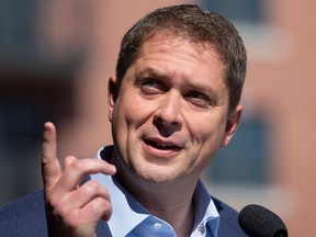 Conservative Party of Canada (CPC) leader Andrew Scheer speaks to the media during a campaign stop in Sainte-Hyacinthe, Quebec, Canada September 19, 2019. REUTERS/Christinne Muschi ORG XMIT: CMU01