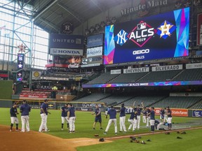 The Astros stretch during practice before the Yankees work out at Minute Maid Park in Houston, on Friday, Oct. 11, 2019.