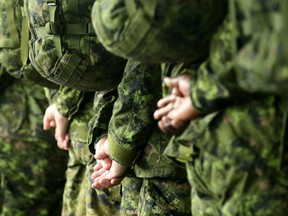 Canadian Armed Forces troops stand at east during the departure parade for the 102nd Nimogen March on Tuesday, July 10, 2018. (Julie Oliver/Postmedia)oldiers