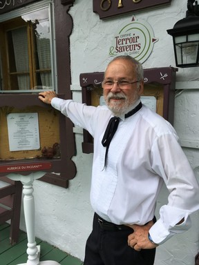 A dapper Gaston Cloutier welcomes diners from across the globe to Auberge Baker. (Kevin Hann)