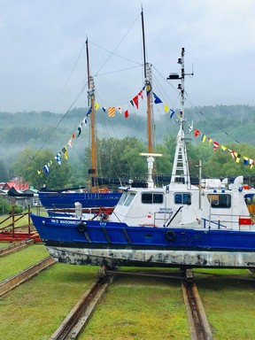 St. Lawrence Seaway Authority’s survey boat VMS Maisonneuve in dry dock with schooner St-Andre on display behind it at Musee Maritime de Charlevoix. (Kevin Hann)